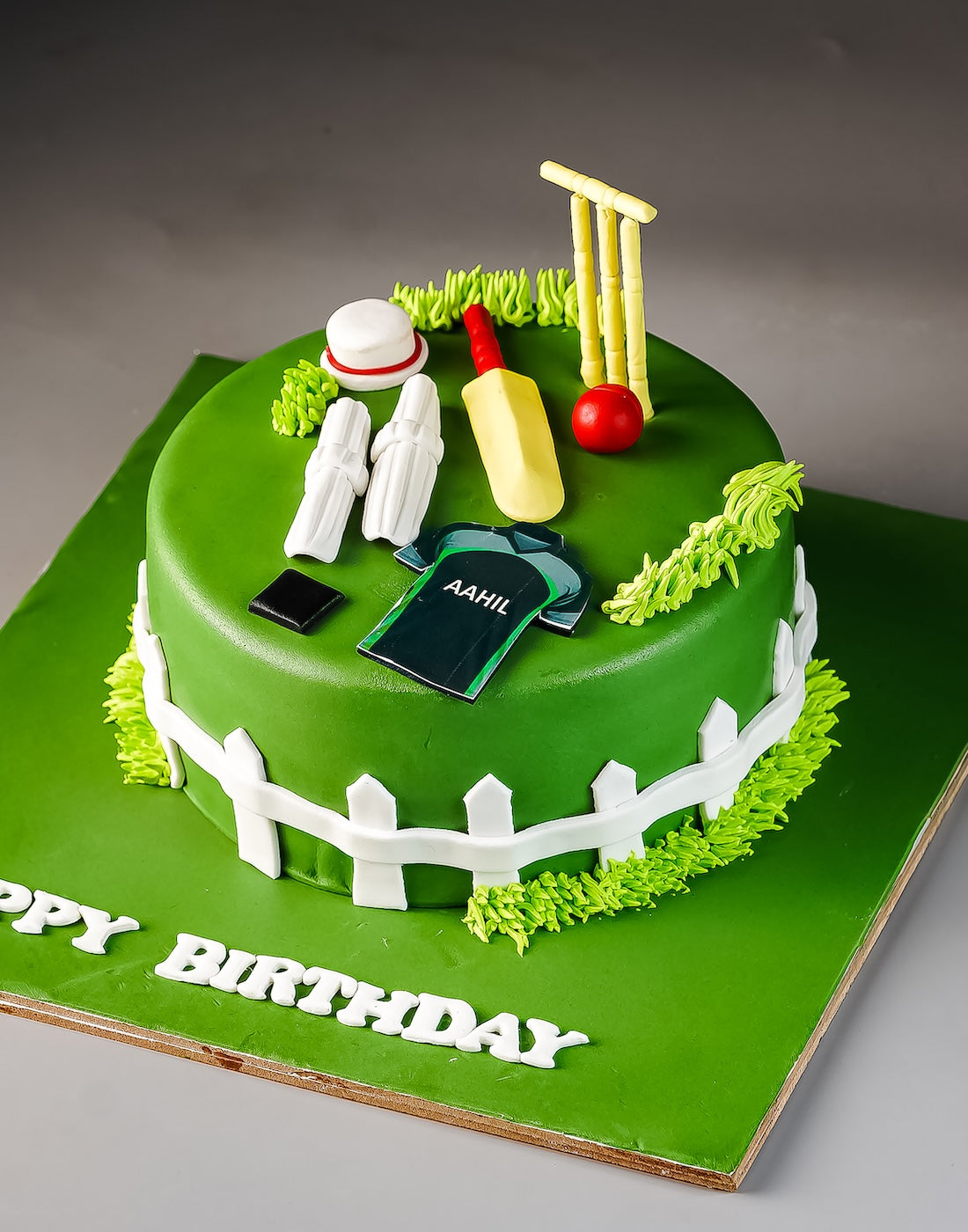 Cricket Theme Cake in Green by Creme Castle