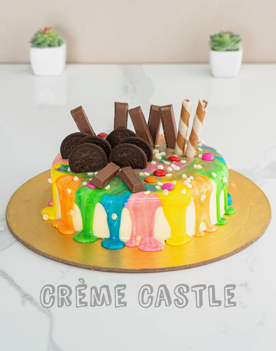 Colorful Drip Cake - Creme Castle