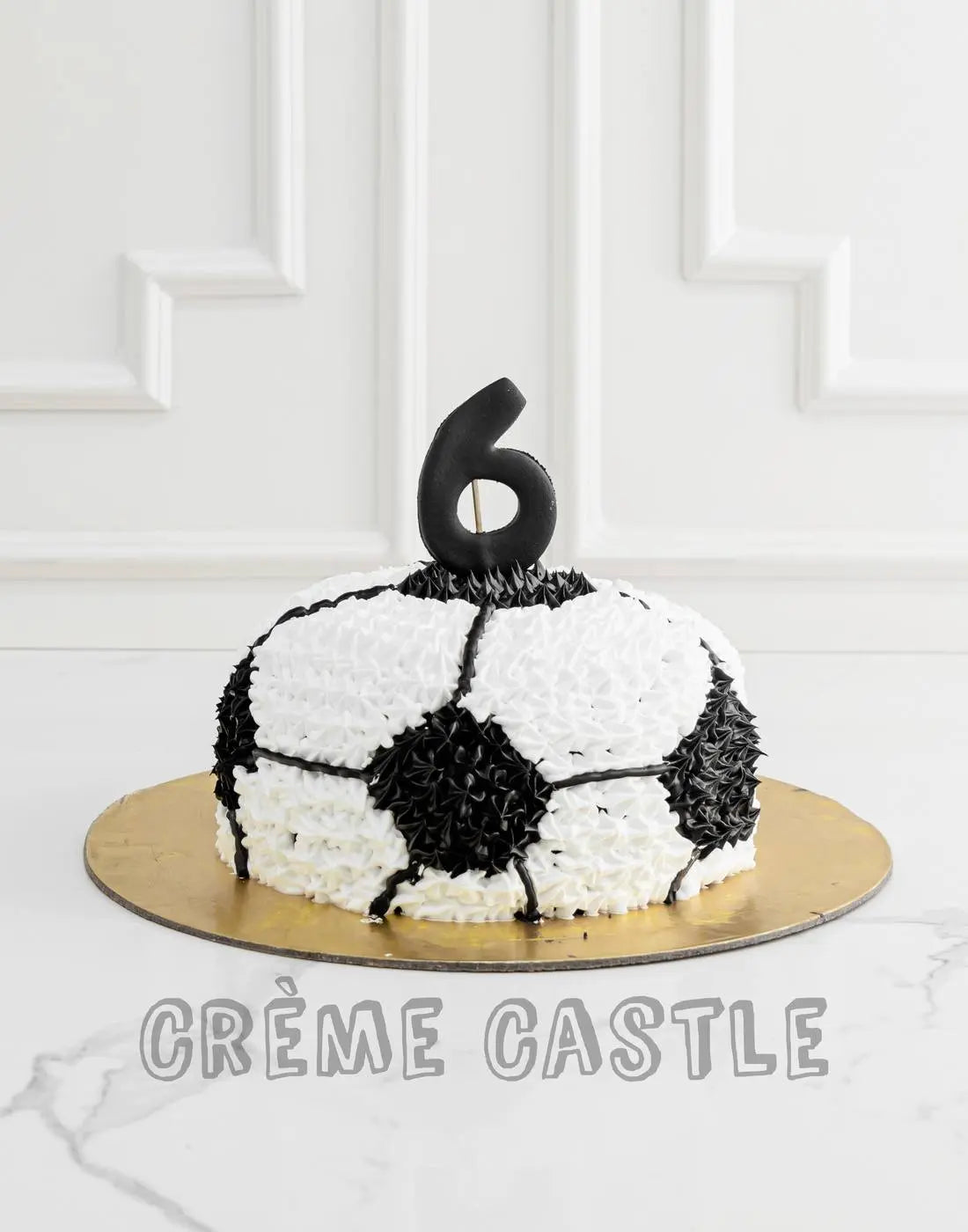 Football Shaped Cake - Creme Castle