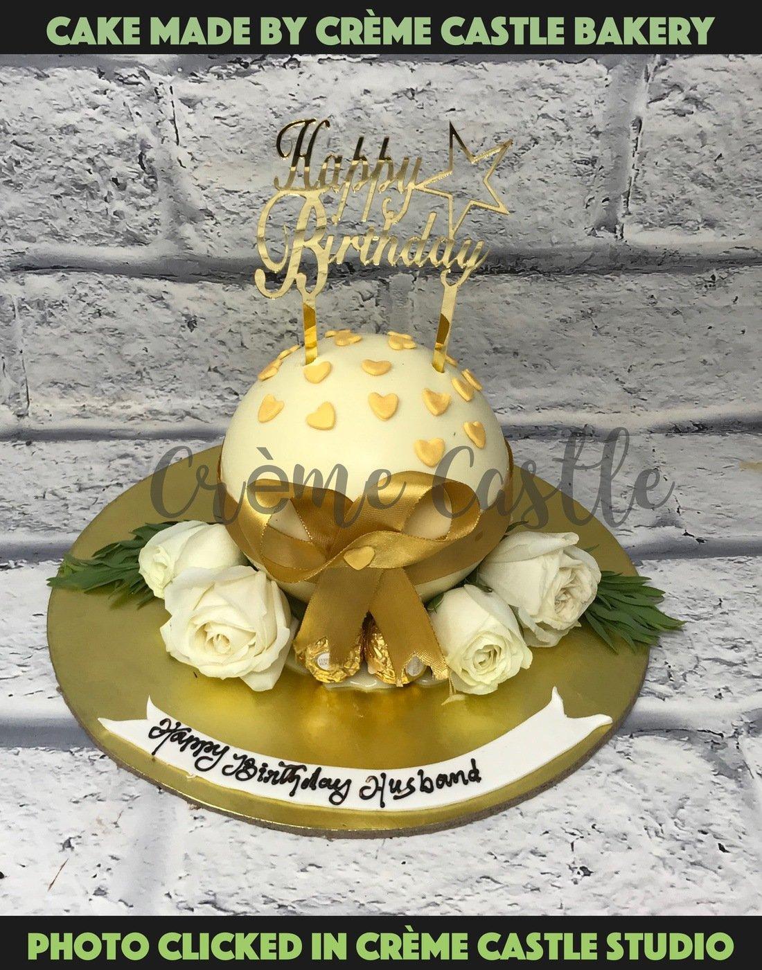 Golden Floral Pinata Cake - Creme Castle