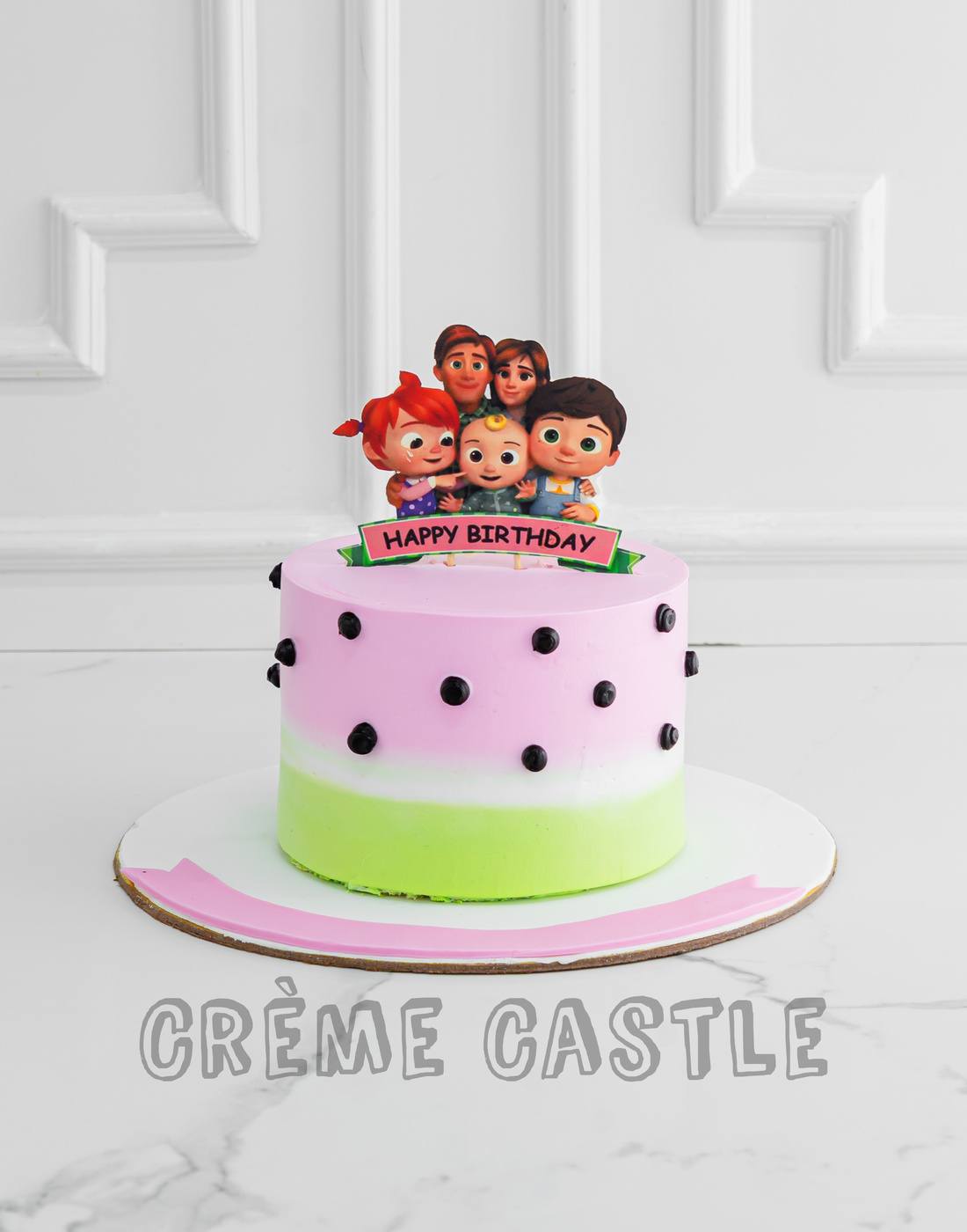 Cocomelon Theme Cake in Pink by Creme Castle