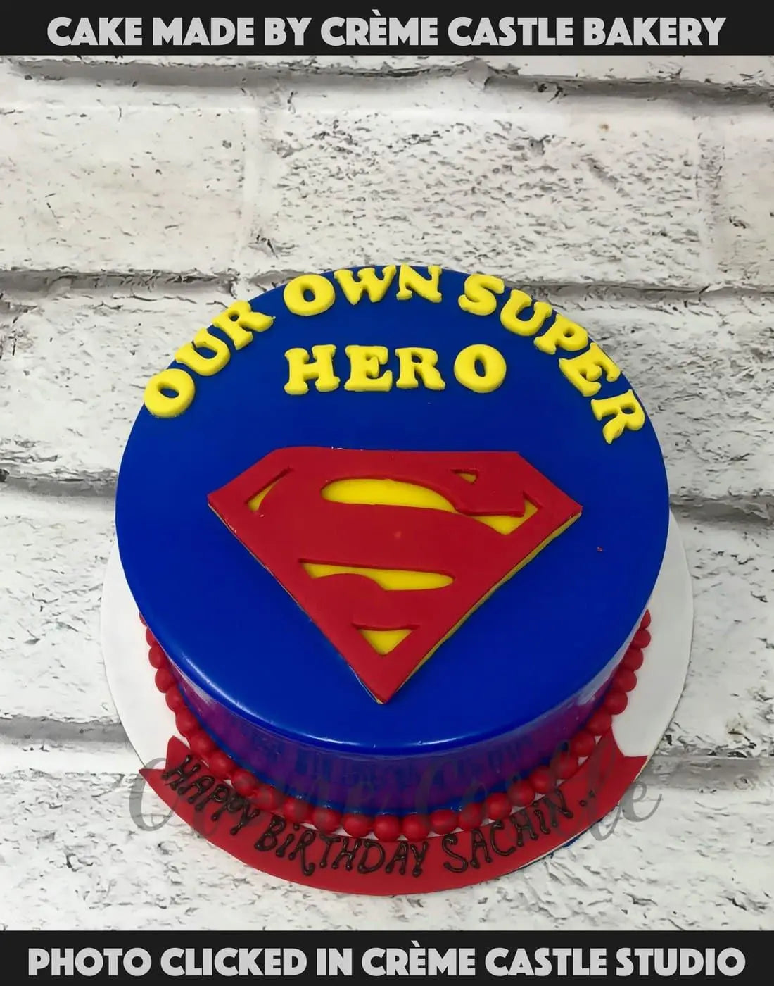 Superman Theme Blue Cake - Creme Castle
