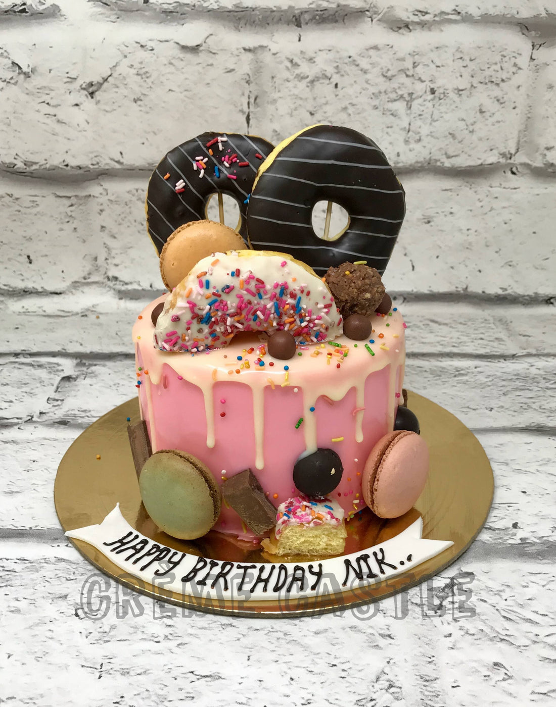 Donut Theme Cake  by Creme Castle