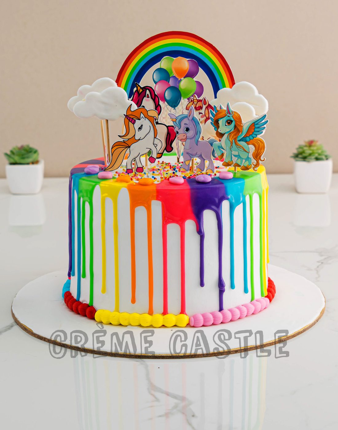 Rainbow Drip Cake - Creme Castle
