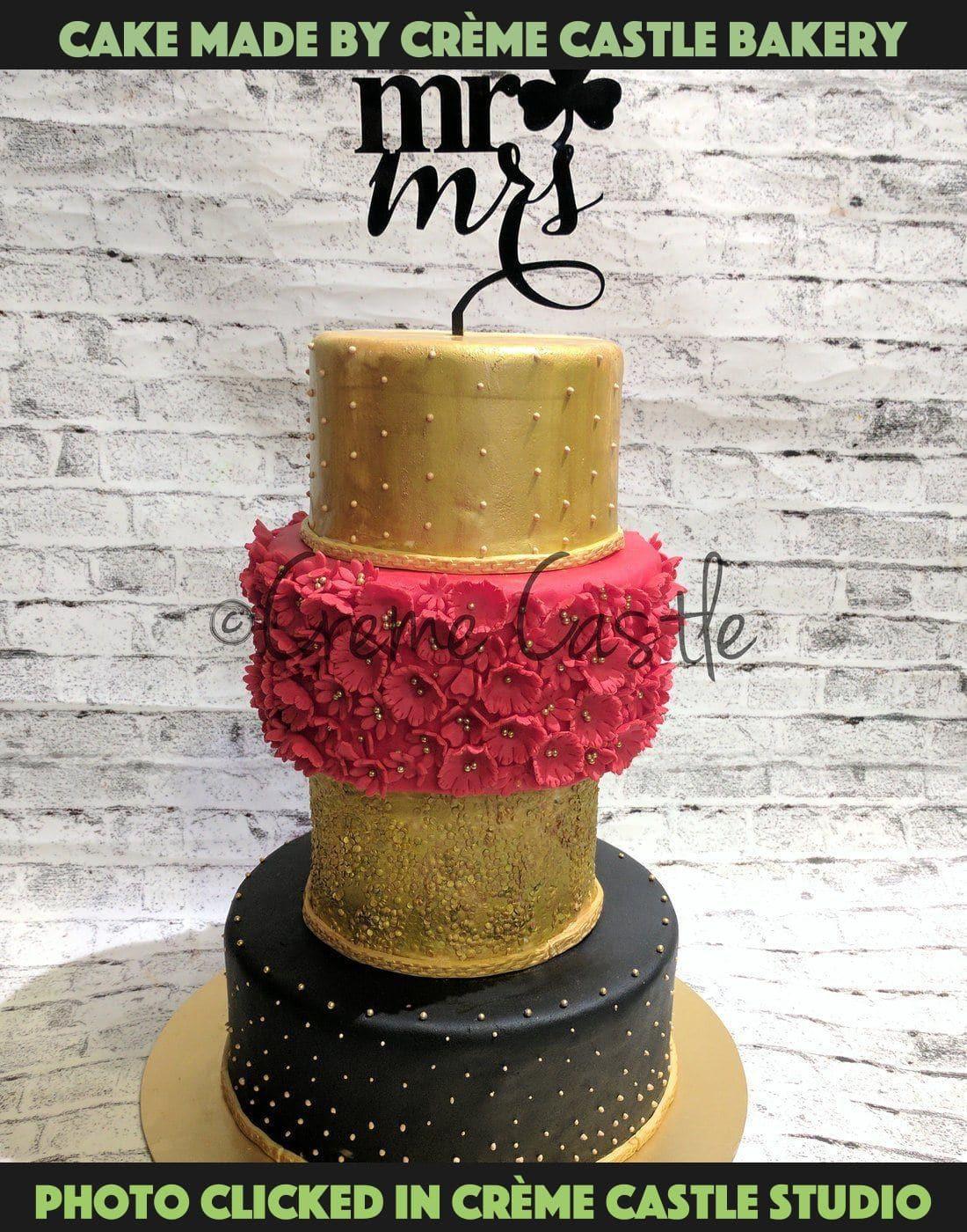 Red and golden wedding cake - Creme Castle