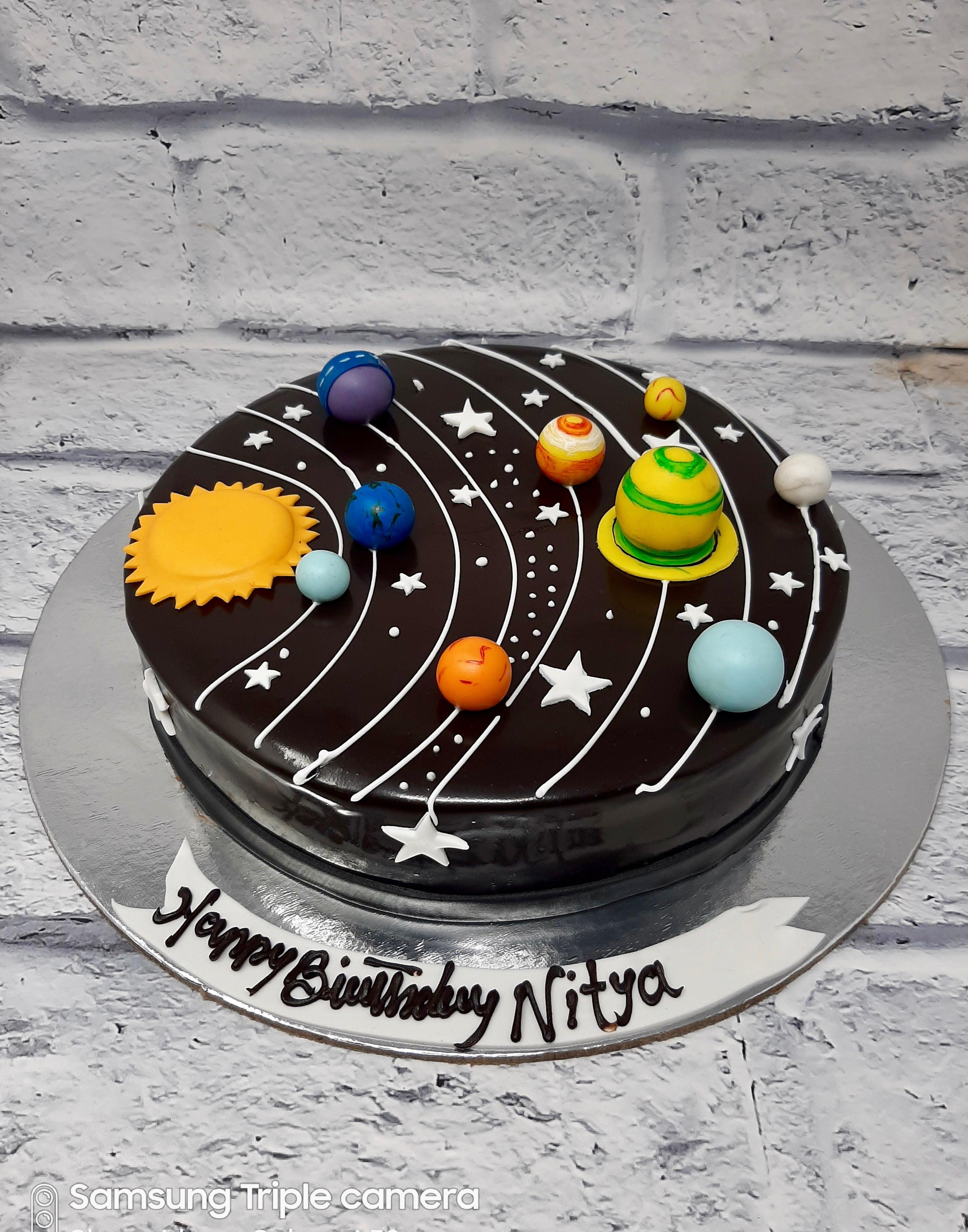 Space theme 2 tier cake with planets and rocket - - CakesDecor