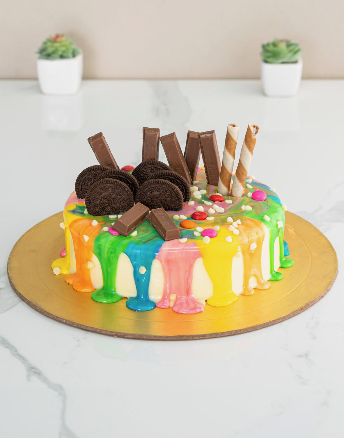 Colorful Drip Cake - Creme Castle
