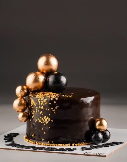 Black and Gold Anniversary Cake