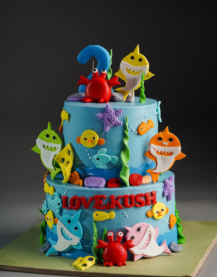 Smiling Baby Sharks Design Cake