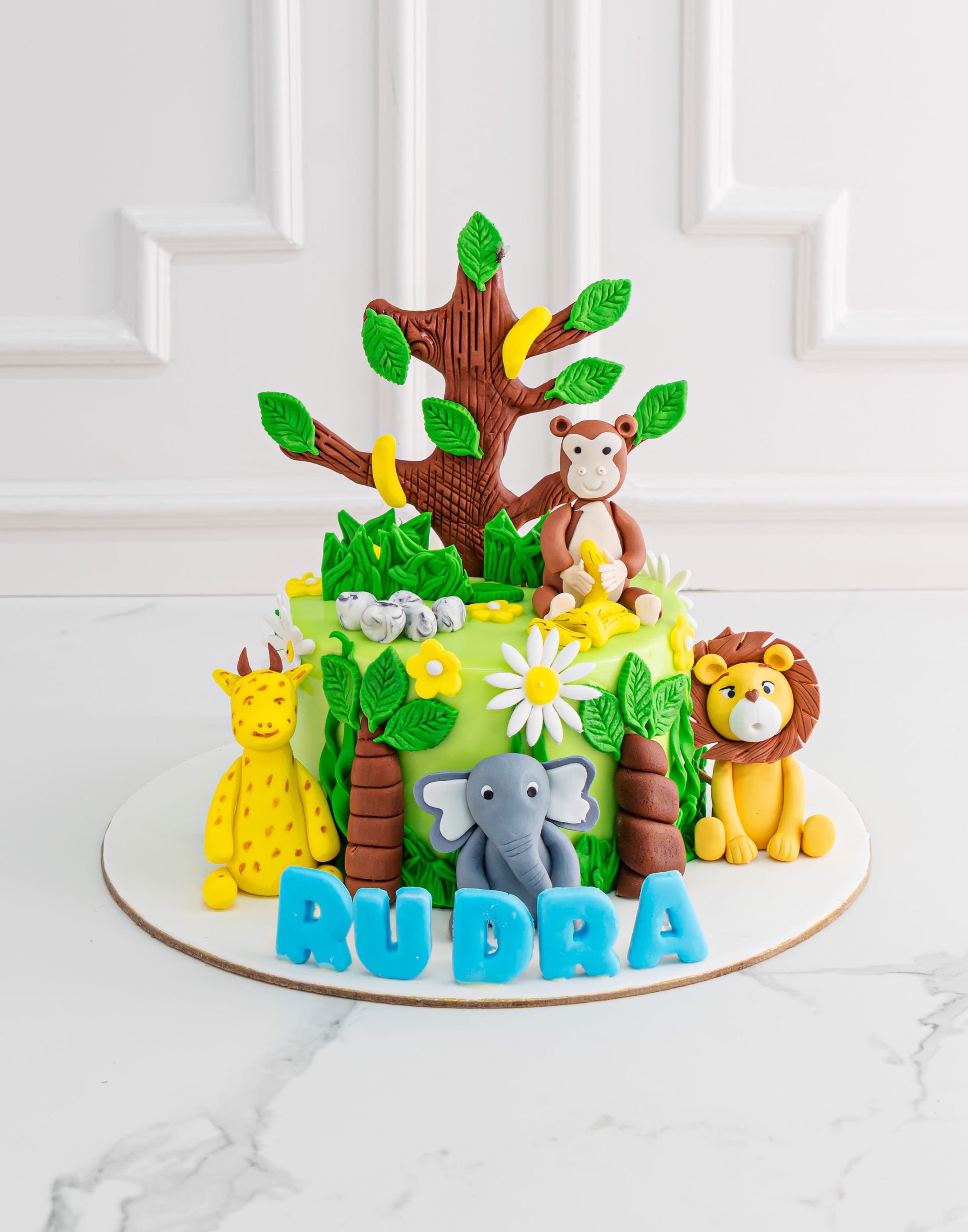 Jungle theme cake with Tree by Creme Castle