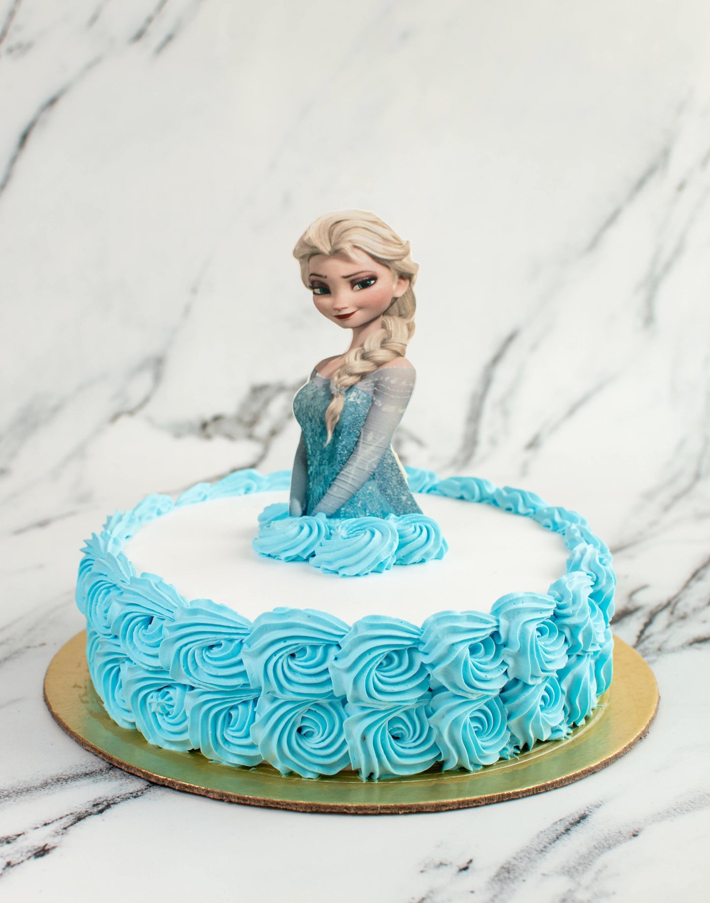 Frozen Theme Cake in Cream by Creme Castle