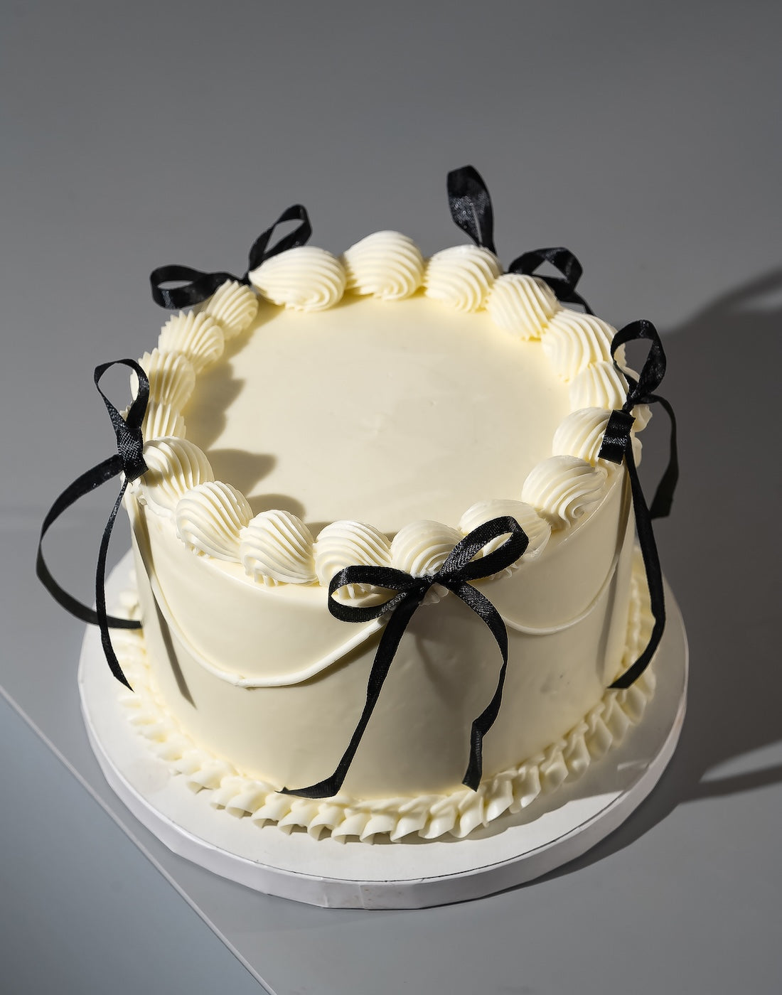 White Vintage Ribbon Cake