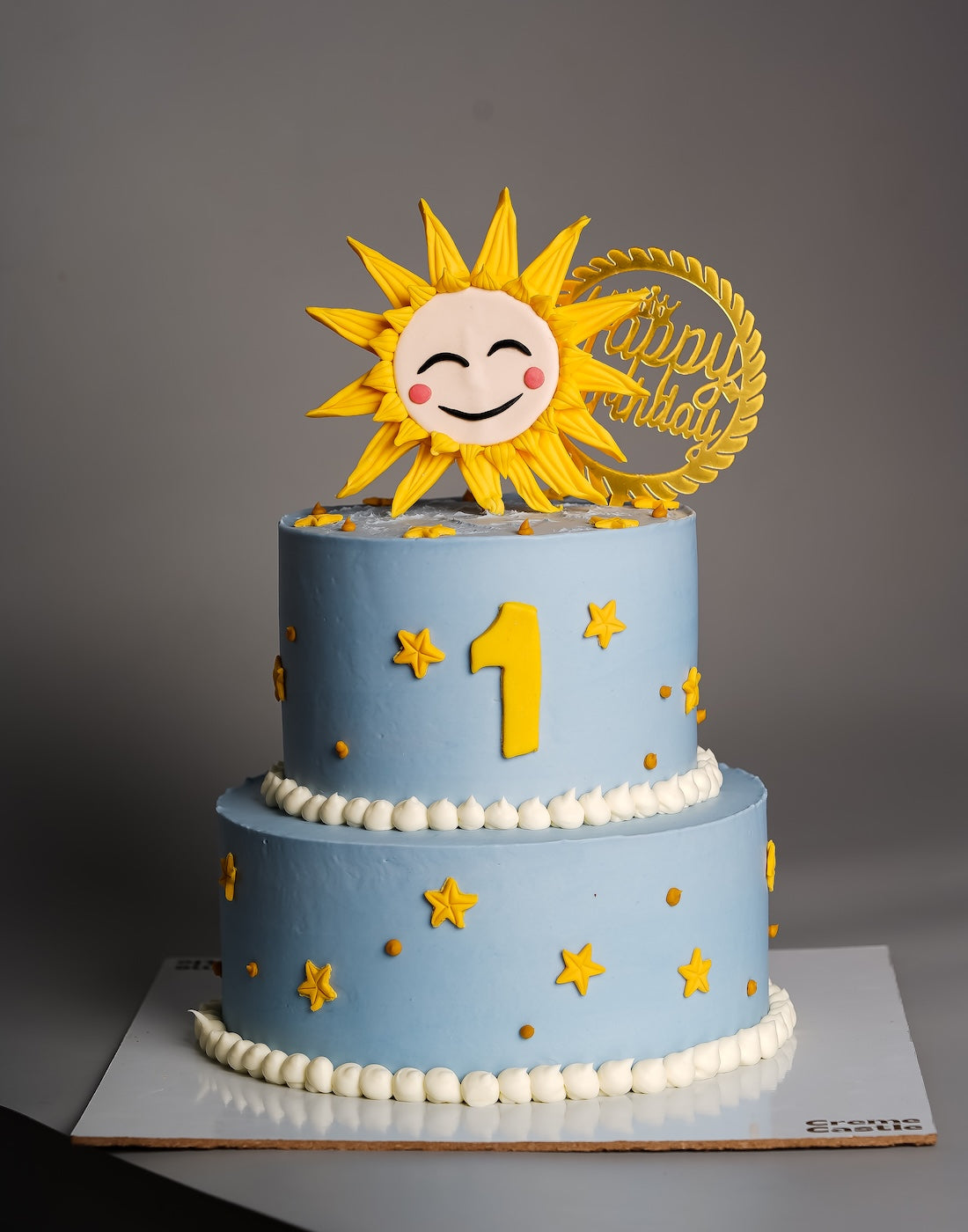 Sun theme two tier cake