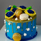 Golden Macaron Drip Floral Cake