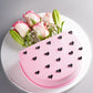 Blush Rose Cake Bouquet - Pink half cake with black hearts and fresh roses