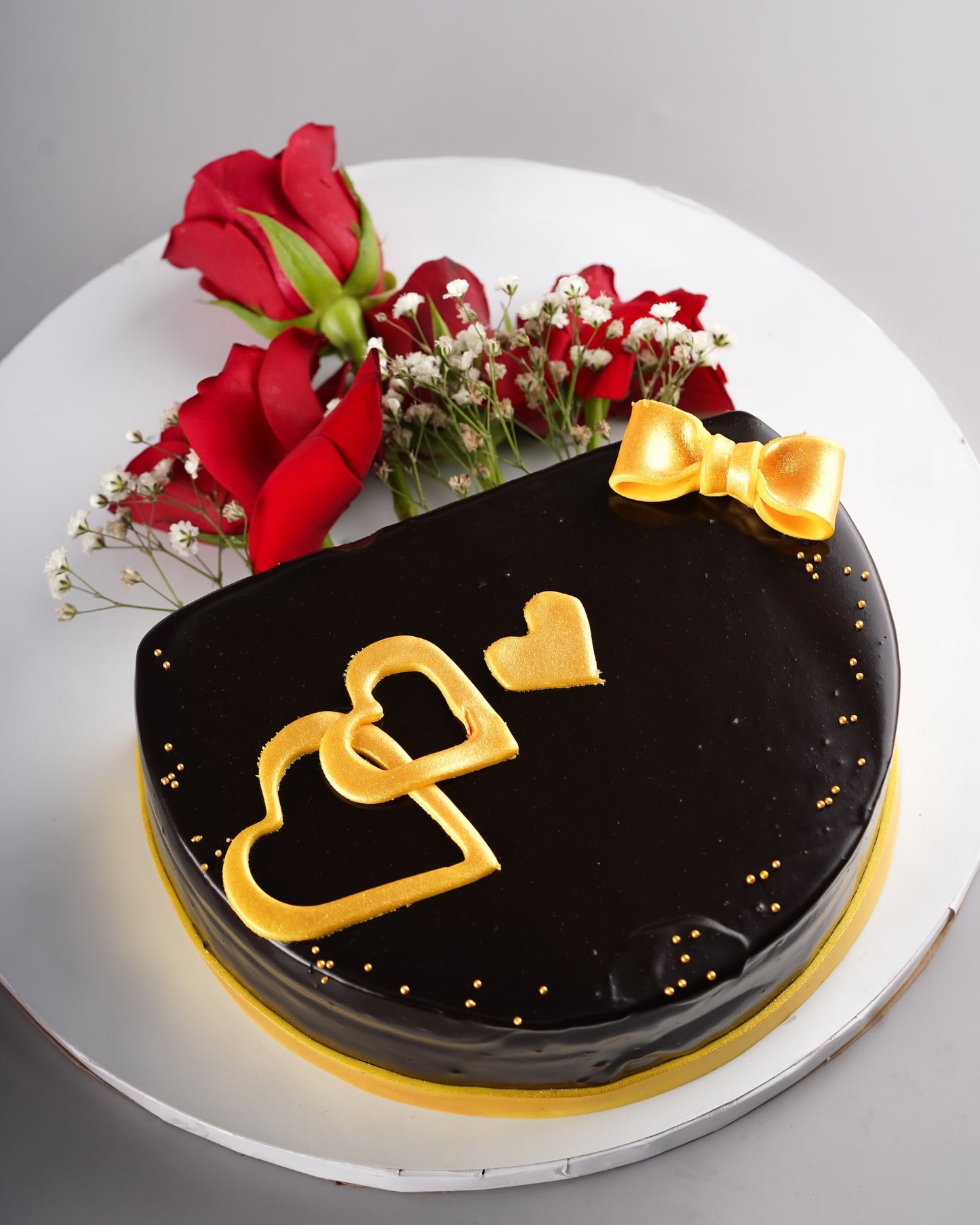 Midnight Gold Cake Bouquet - Chocolate glazed cake with gold hearts and red roses