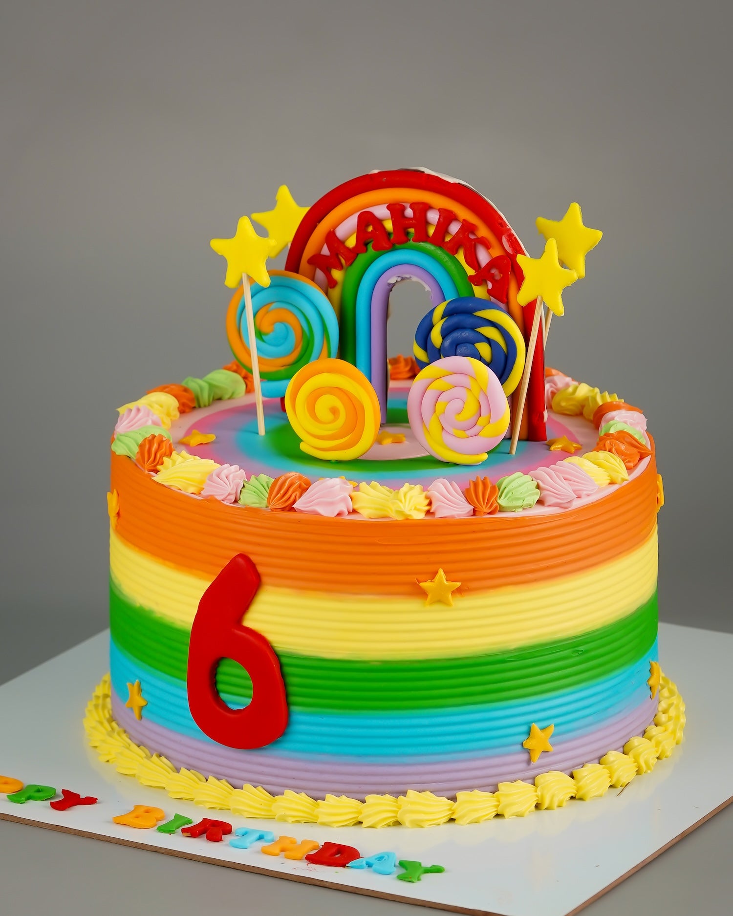 Rainbow Stripes Lollipop Cake