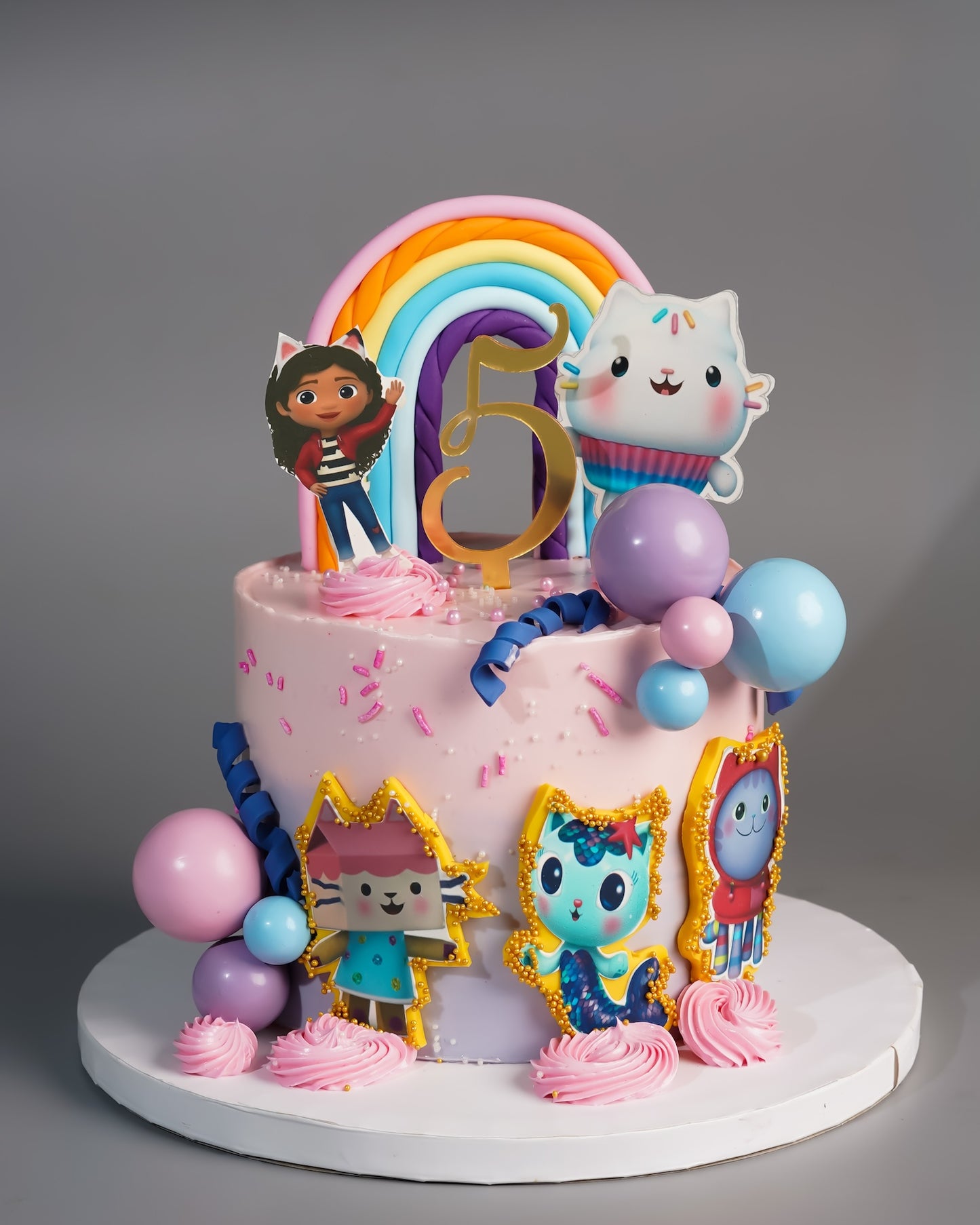 Gabby's Dollhouse Rainbow Cake