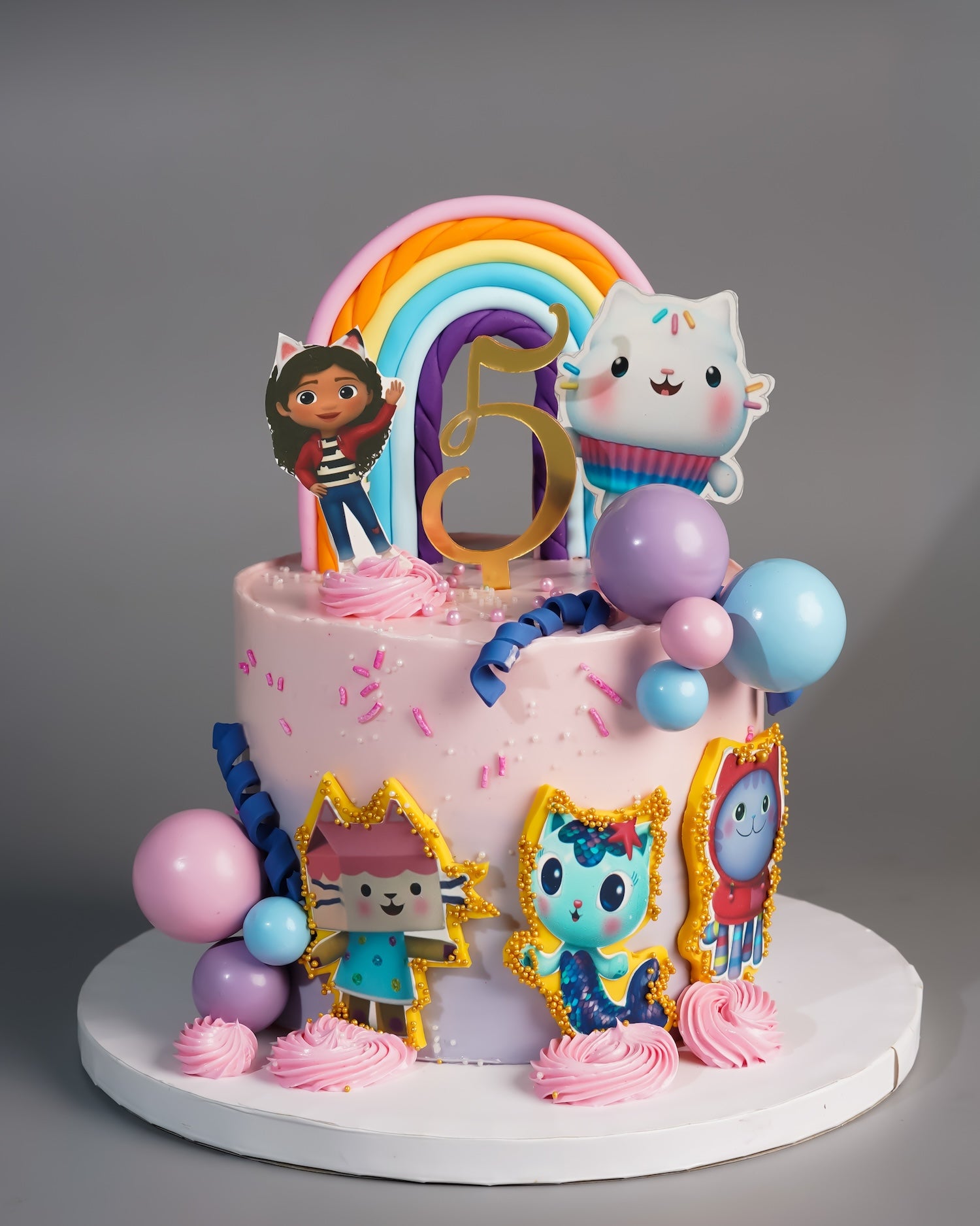Gabby's Dollhouse Rainbow Cake