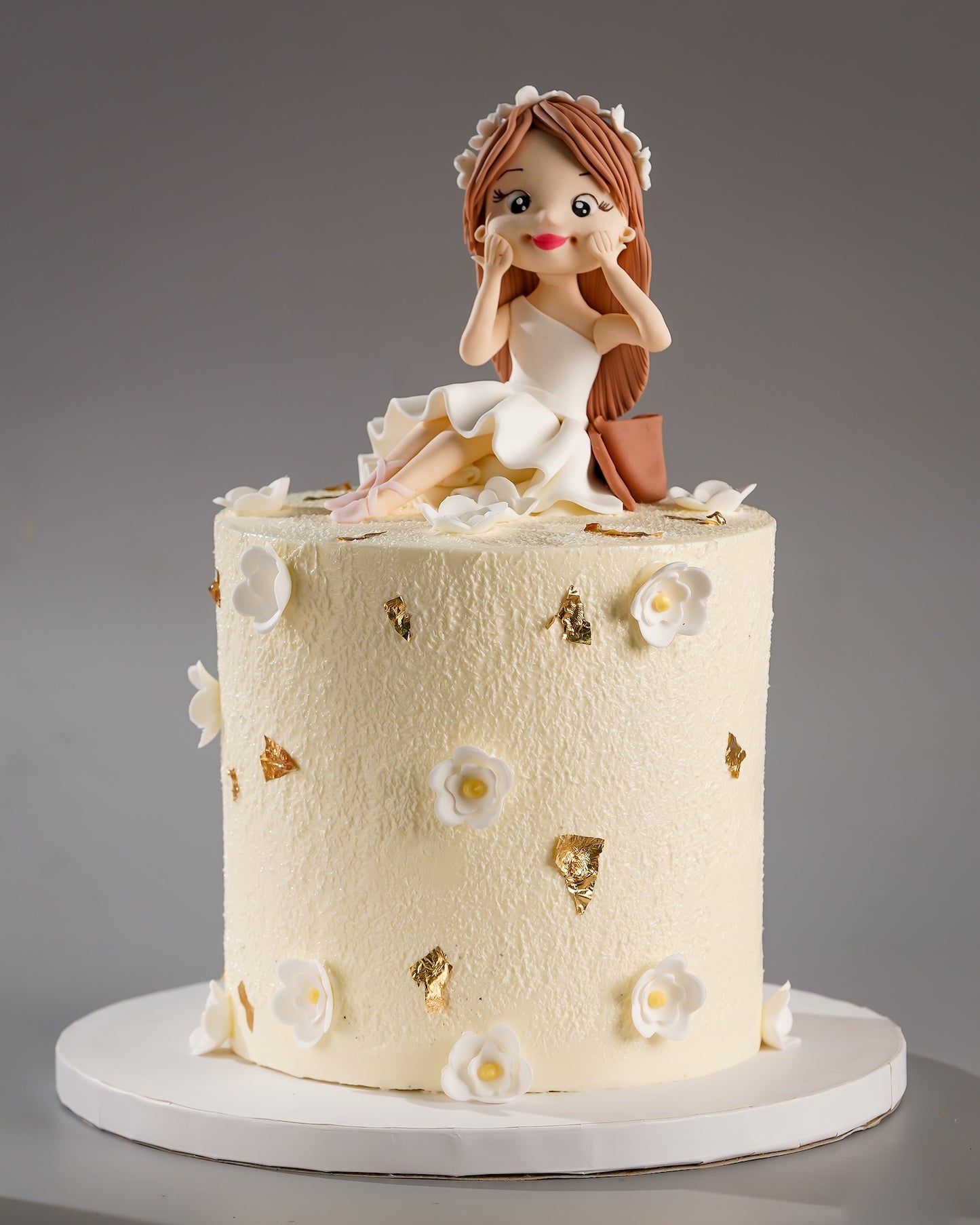 Gold Leaf Doll Cake