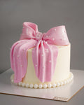 Pink Bow Pearl Drape Cake