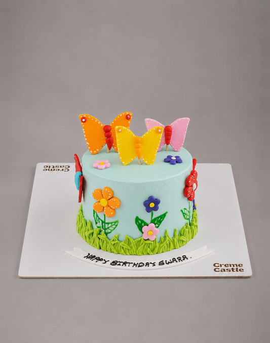 Butterfly theme cake by Creme Castle