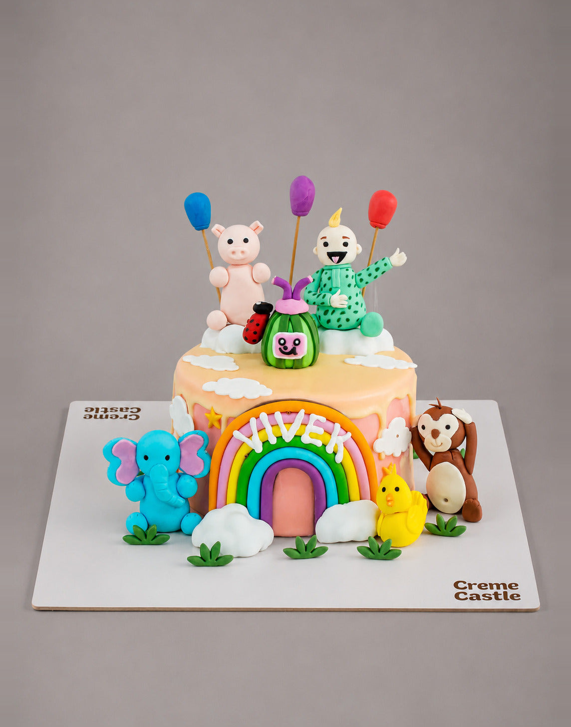 Cocomelon Family Drip Design Cake - Creme Castle