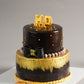 Chocolate and Gold Cake - Creme Castle