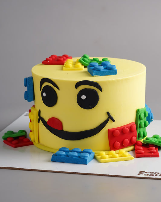 Lego Face Design Cake - Creme Castle