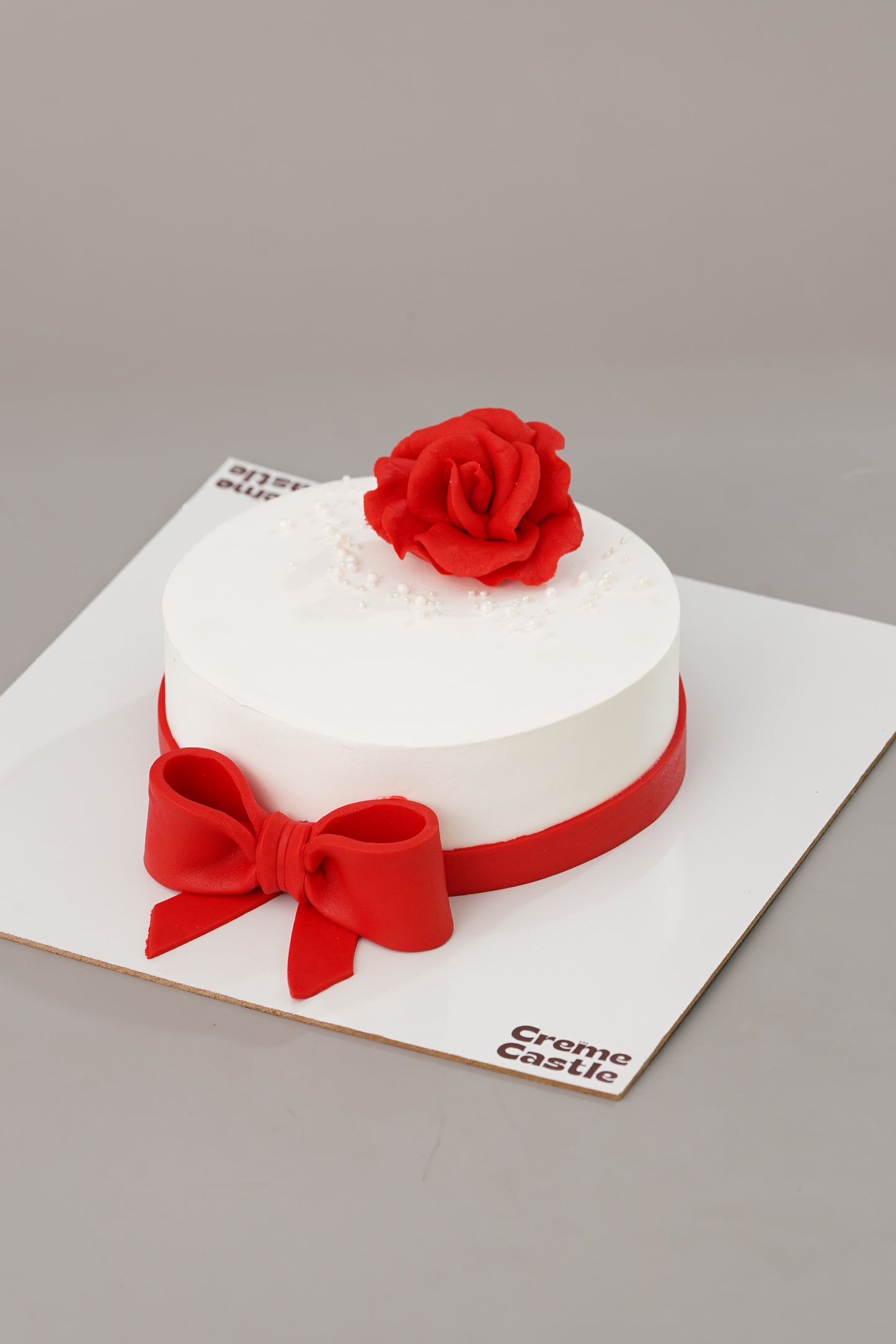 Rosey Bow Cake - Creme Castle