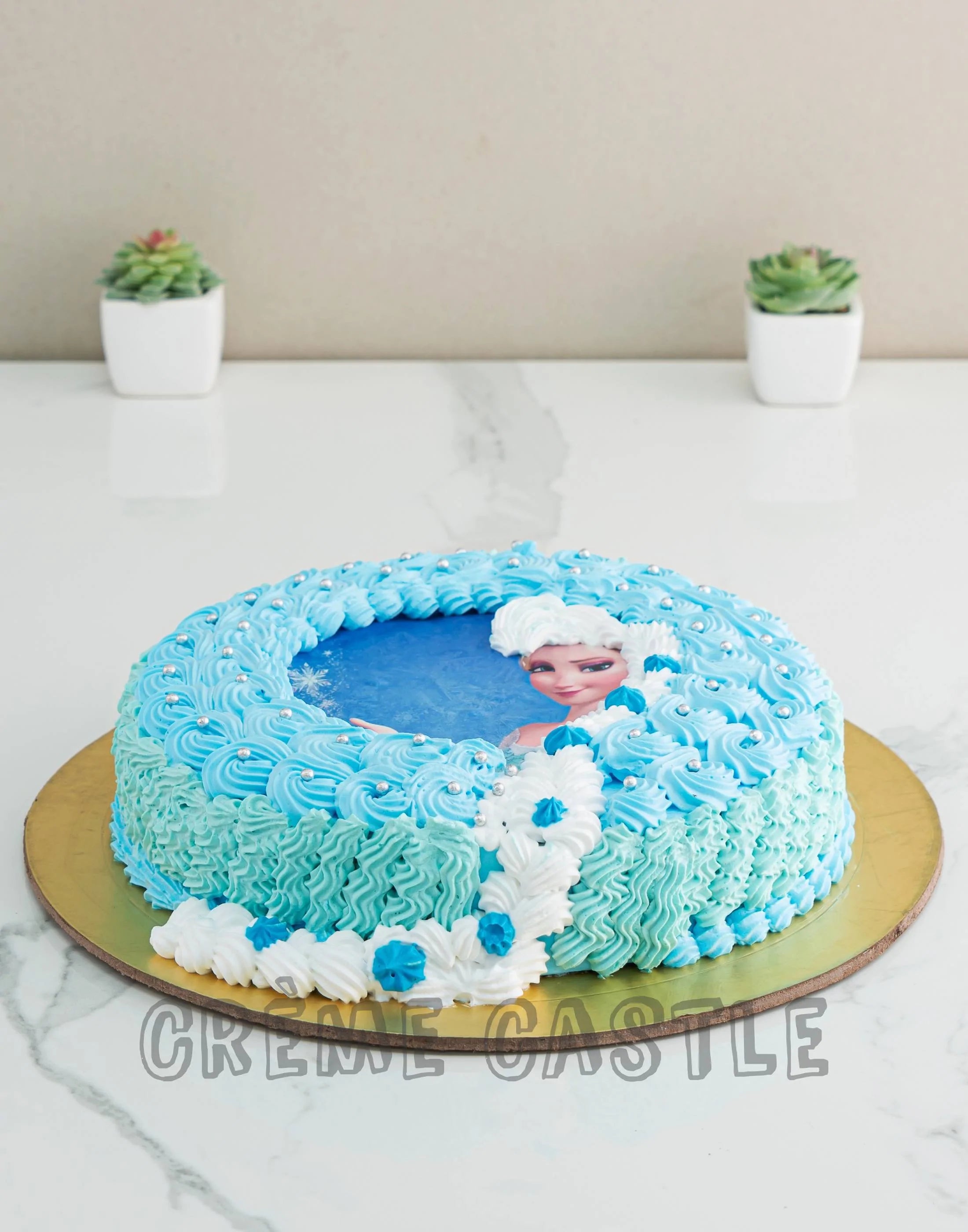 Pretty cake decorating designs we've bookmarked : Little snow flakes Frozen  Cake