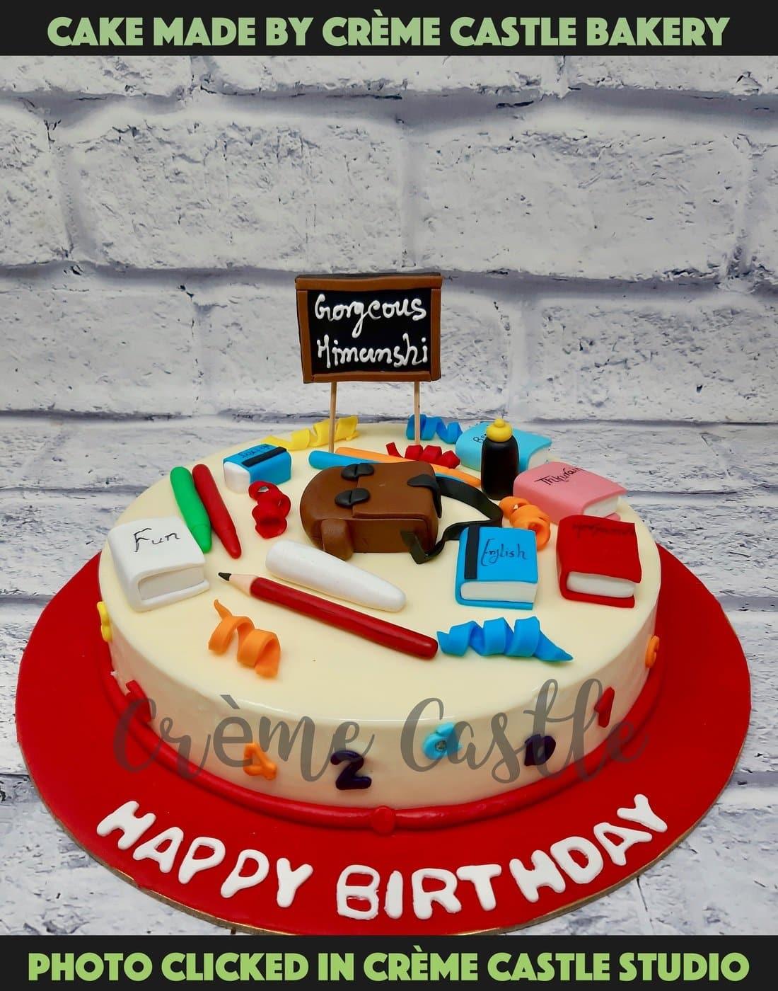 School theme cake by Creme Castle