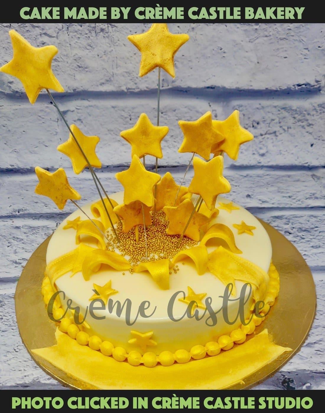 Golden stars cake - Creme Castle