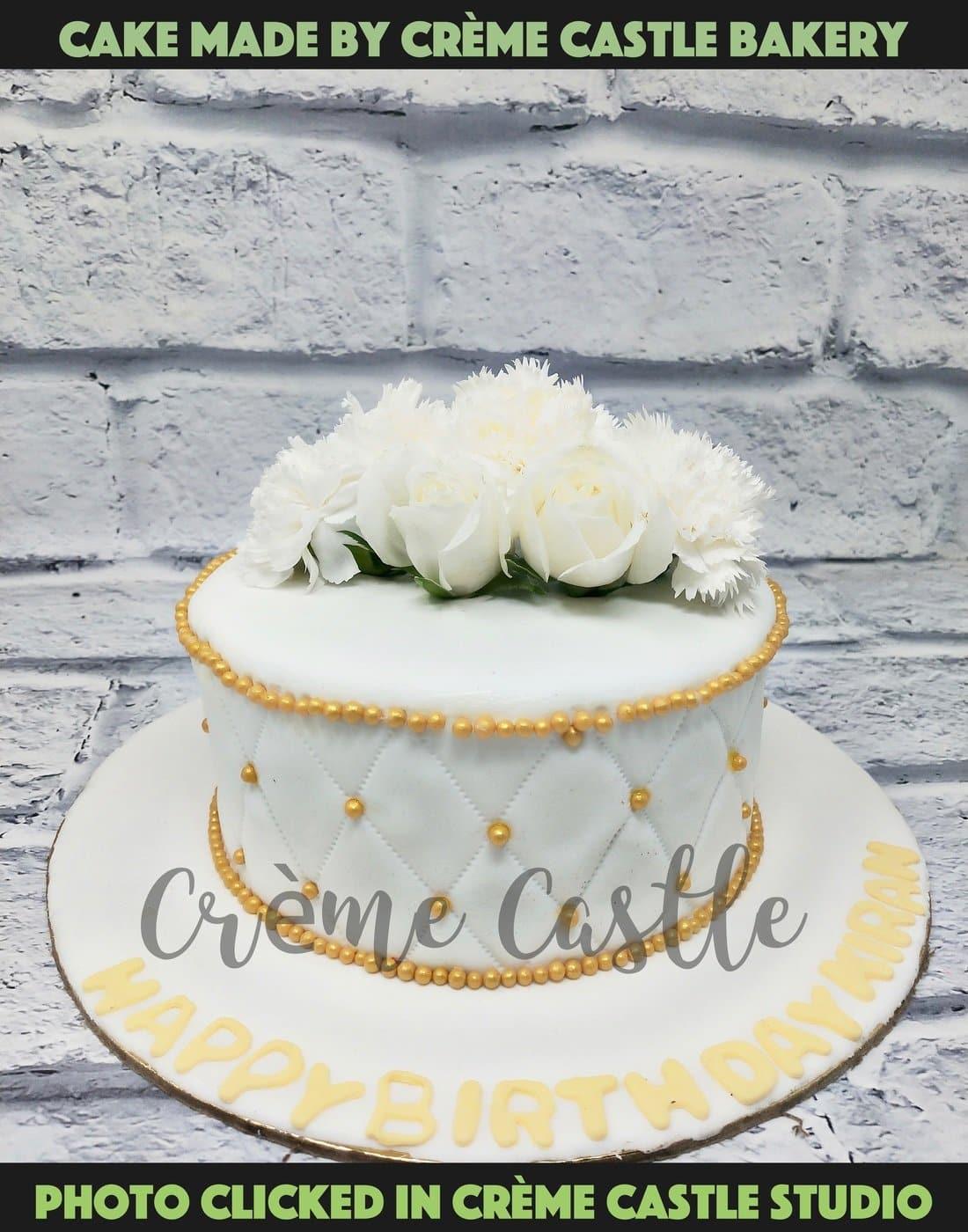 Elegant flower bouquet cake - Creme Castle