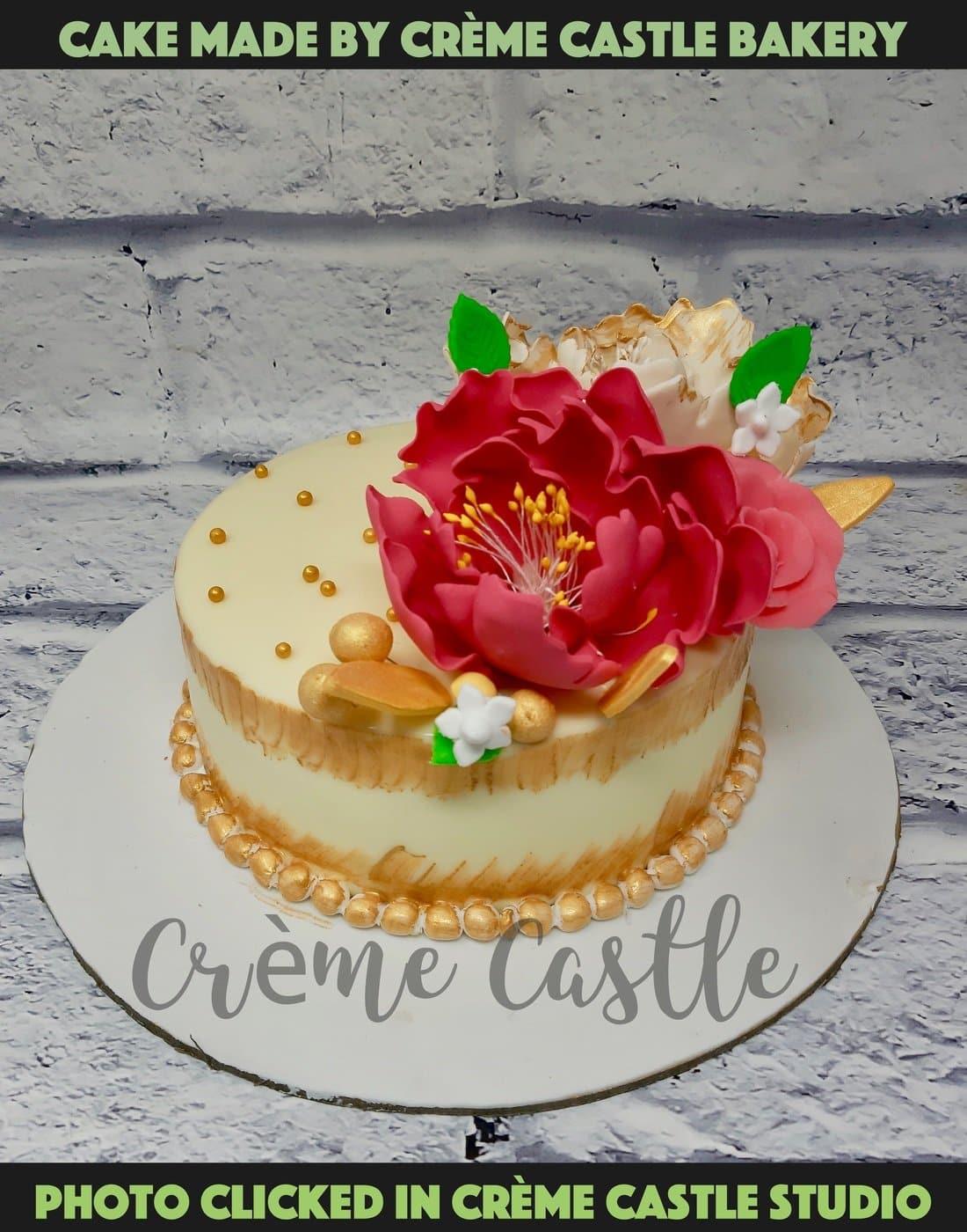 Floral Hand crafted cake - Creme Castle