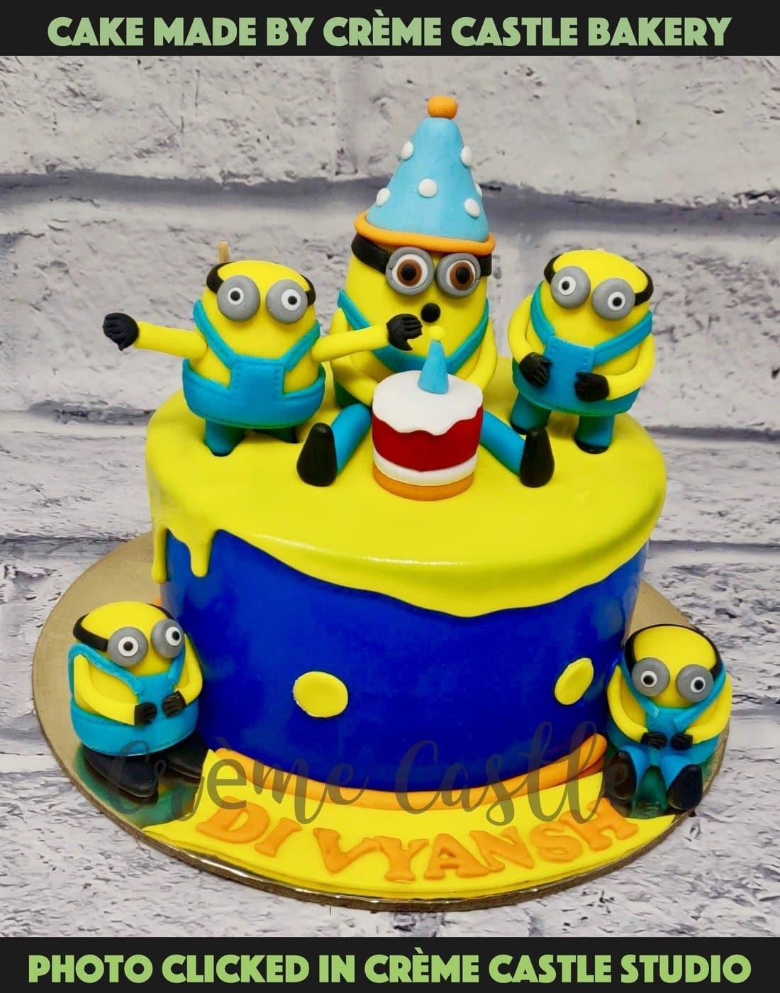 Minions Theme Blue Cake - Creme Castle