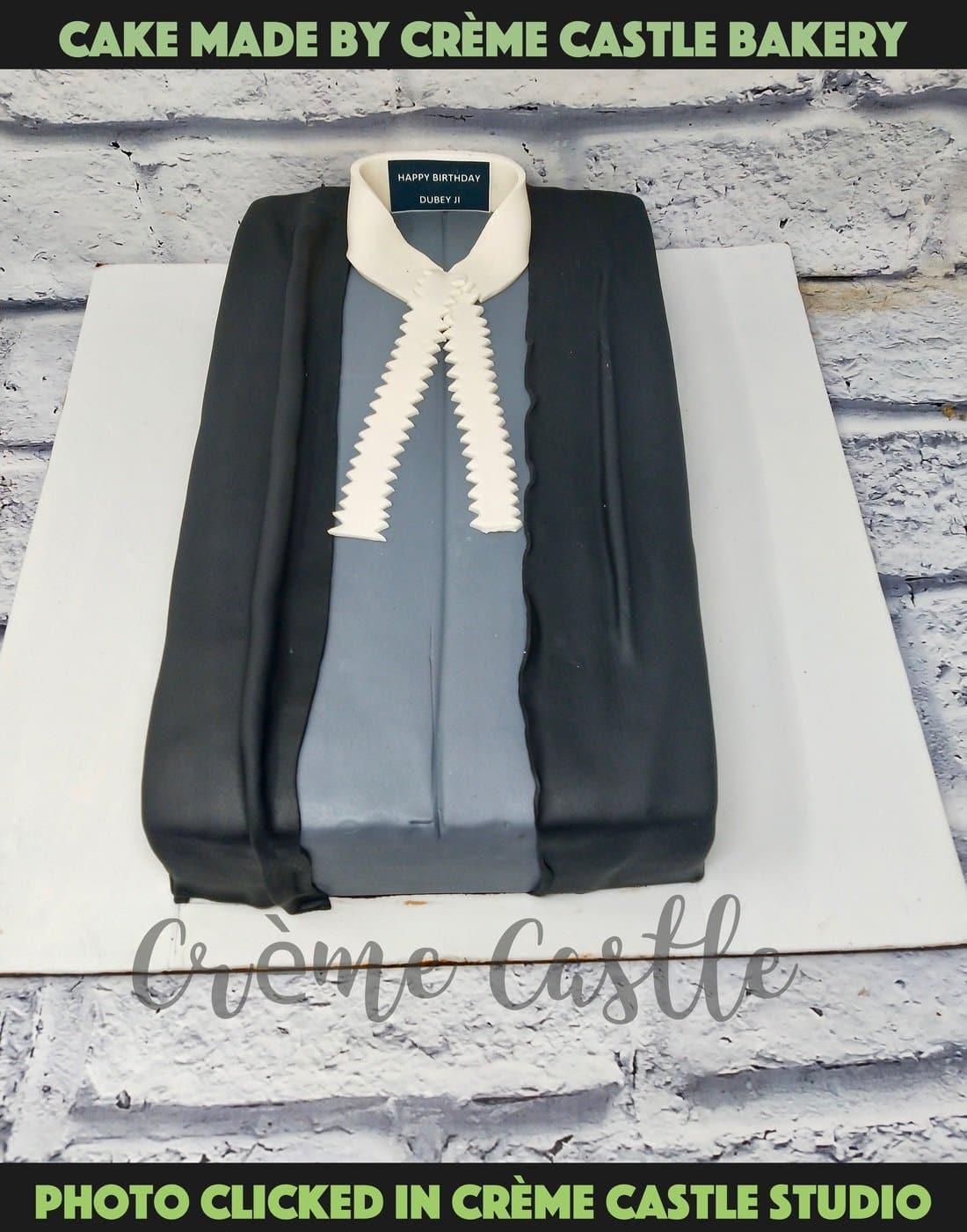 The BakeHaus Sweet Stories - Cake for a Lawyer. A simple yet a  sophisticated cake !! . . . In frame:Pineapple cream cake. Topped with  fondant accents in black n white to