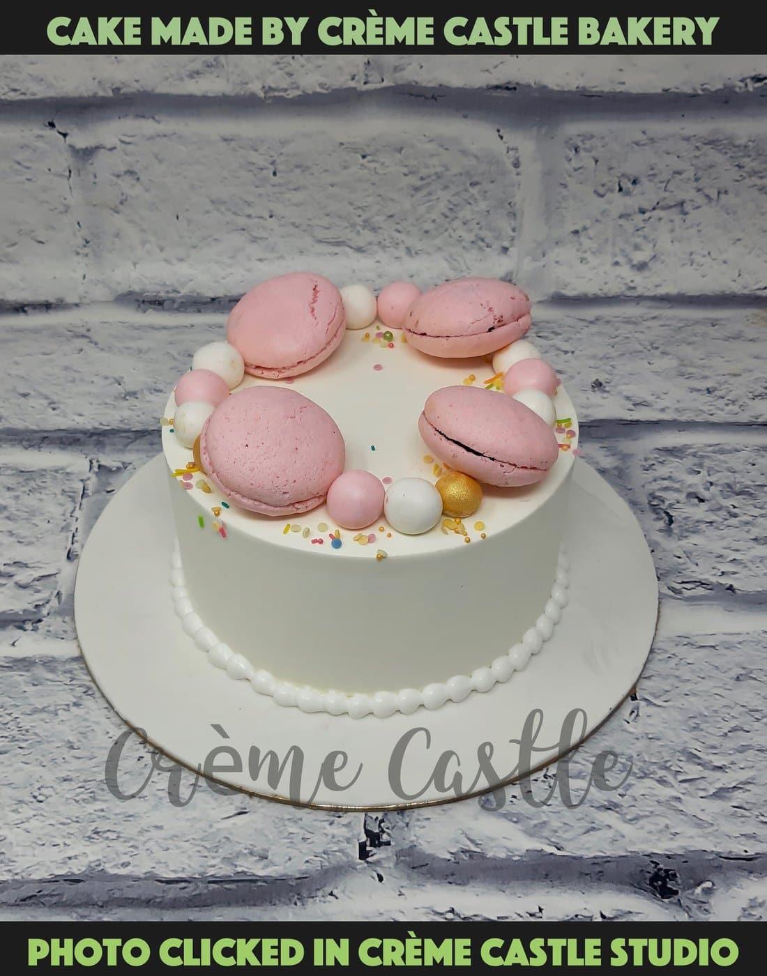 Macaroons on Cake - Creme Castle