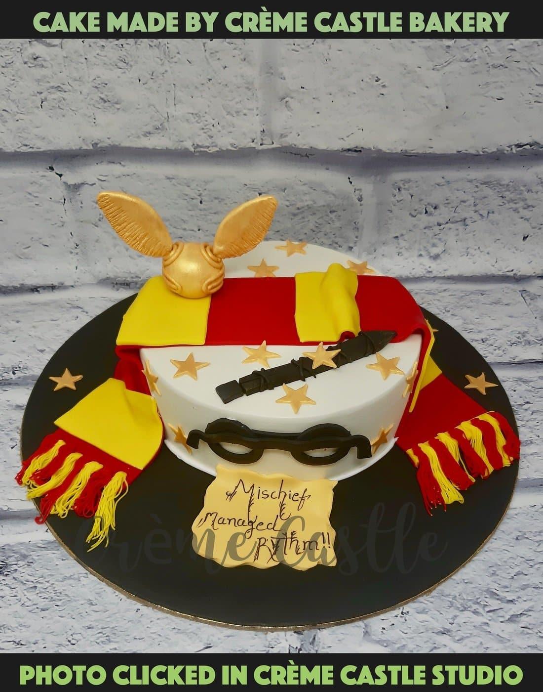 Harry Potter Theme Cake. Wand Snitch Cake. Noida & Gurgaon