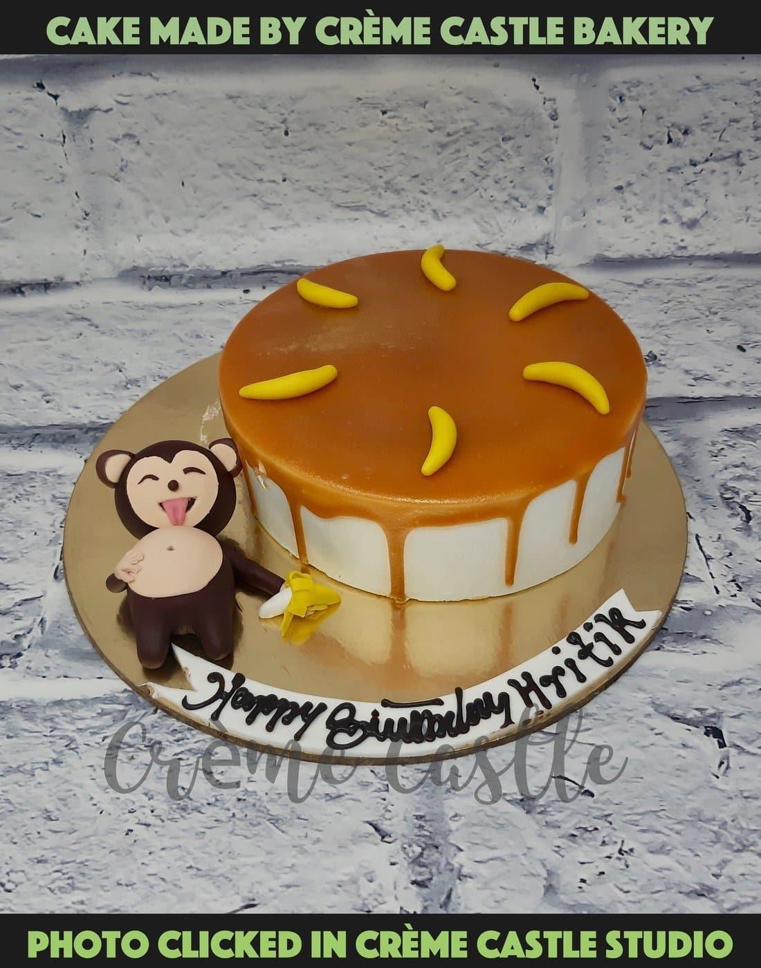 I ordered a custom cake based on the image produced with the prompt : A cake  design of a funny monkey with a banana on is head. : r/dalle2