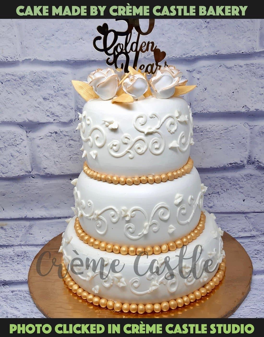 A 3 layer cake with elegant fondant design made for grand ceremonies. A full fondant made with artistic precision