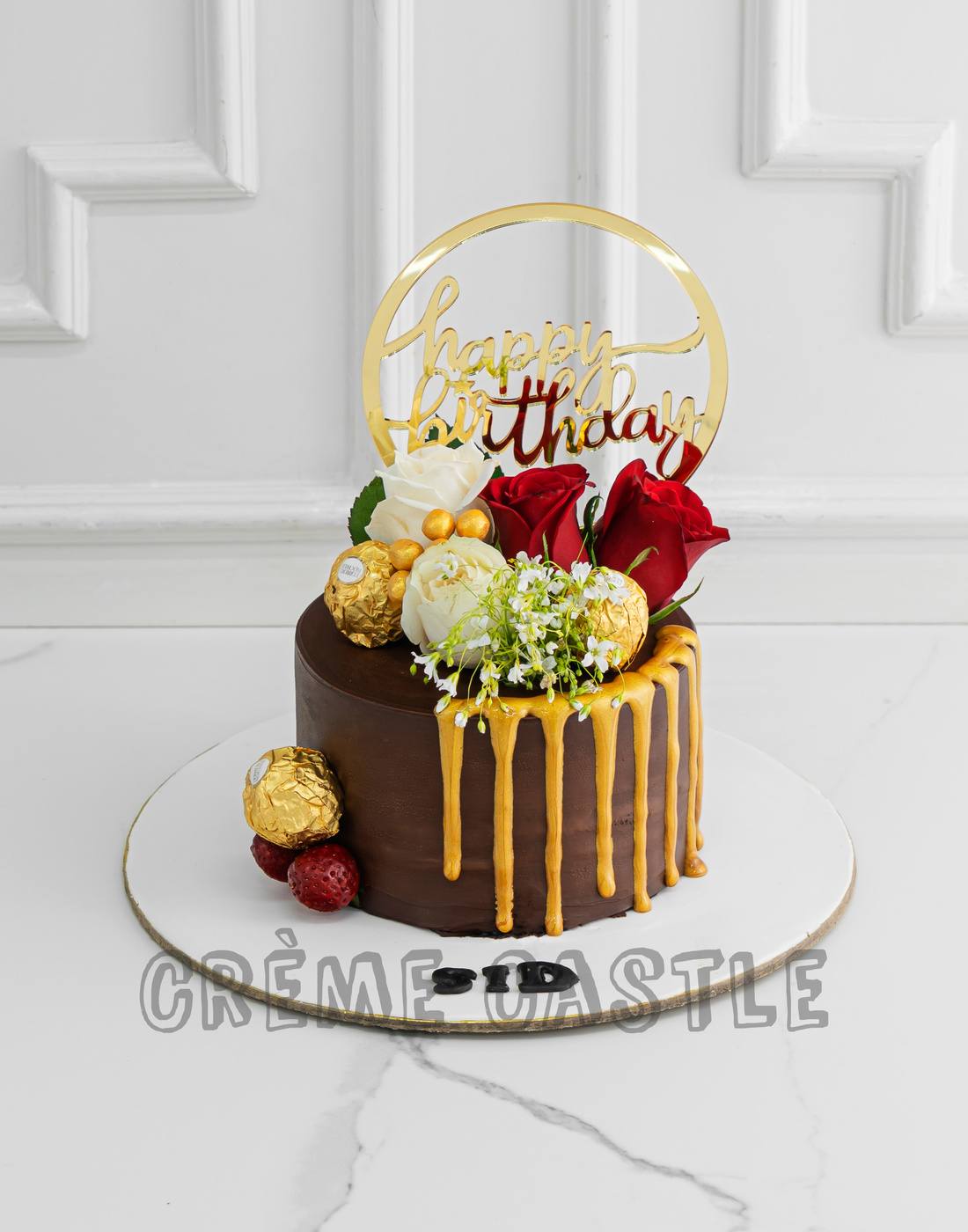 Chocolate Floral and Drip cake - Creme Castle