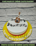 Guitar and Music Notes Cake
