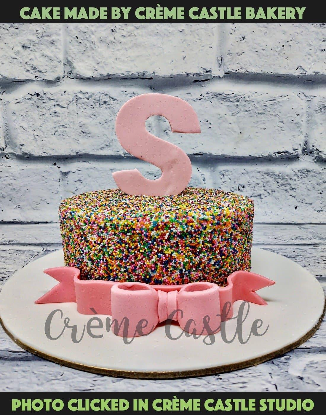 Sprinkle Alphabet Cake - Creme Castle