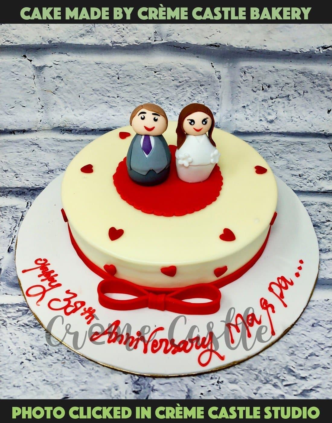 Couple figures cake - Creme Castle