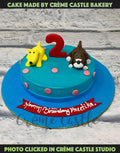 Dogs on a Cake