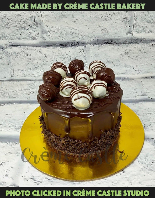 Chocolate Sin and Truffle Balls Cake - Creme Castle