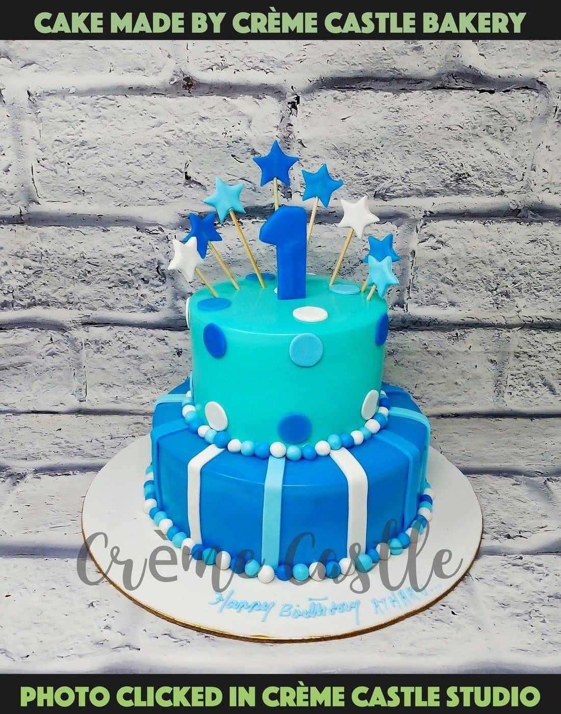Blue them Tier Cake - Creme Castle