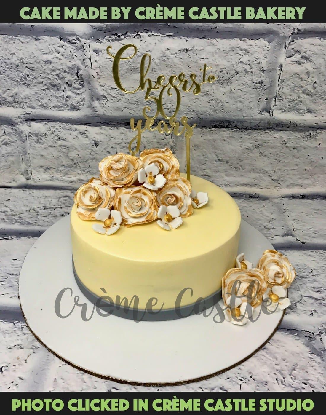 50th Birthday Golden Cake - Creme Castle