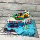 Ship Cargo Design Cake - Creme Castle